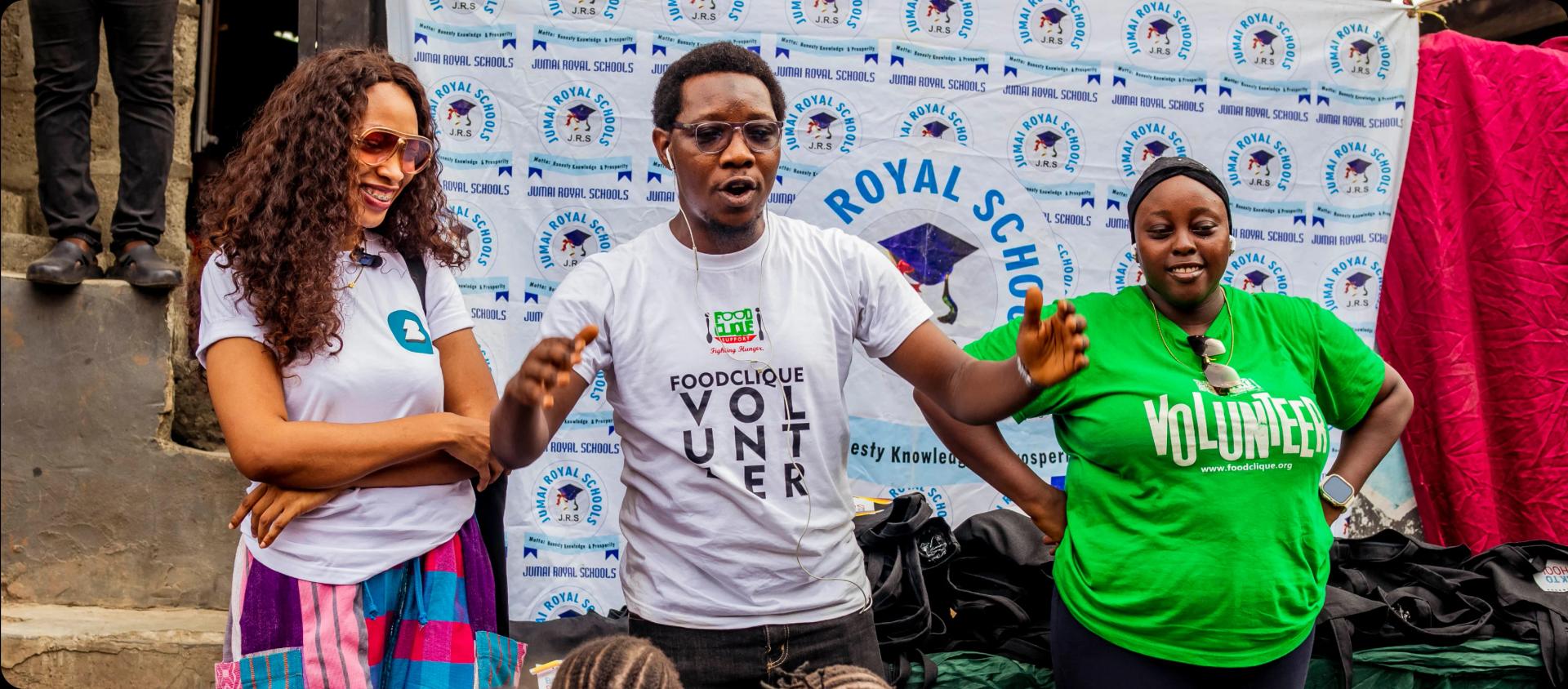 a man giving a speech to children